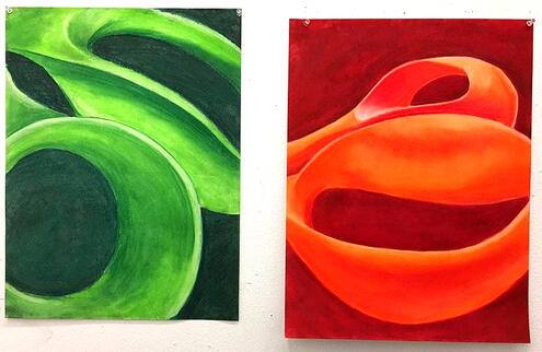 Diptych of two scissor handles. One in green pastels, and one in orange pastels.
